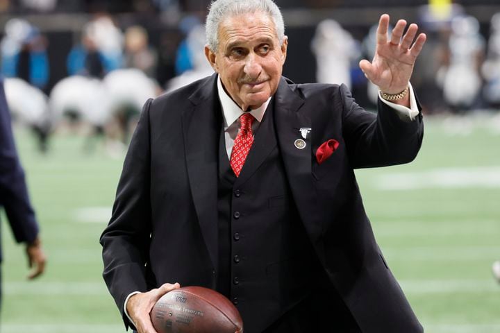 Falcons owner Arthur Blank greets fans before the game against the Panthers on Sunday in Atlanta. 
 (Miguel Martinez / miguel.martinezjimenez@ajc.com)