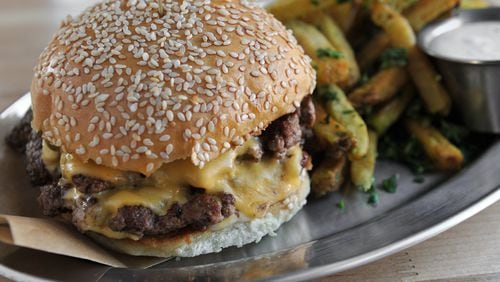Bocado Burger Stack- american cheese, b&b pickles, mayo. Served with herb fries. (Beckysteinphotography.com)