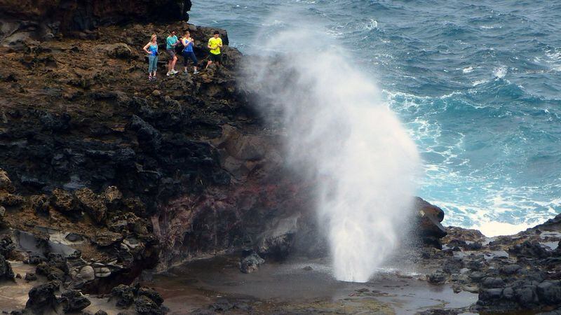 Nakalele Blowhole spouts high on a high-surf day. It&apos;s one Maui attraction that is at its best in stormy weather. On a showery day, you might not mind getting wet from the spray. Just keep your distance and watch your footing on the wet lava rock. (Brian J. Cantwell/Seattle Times/TNS)