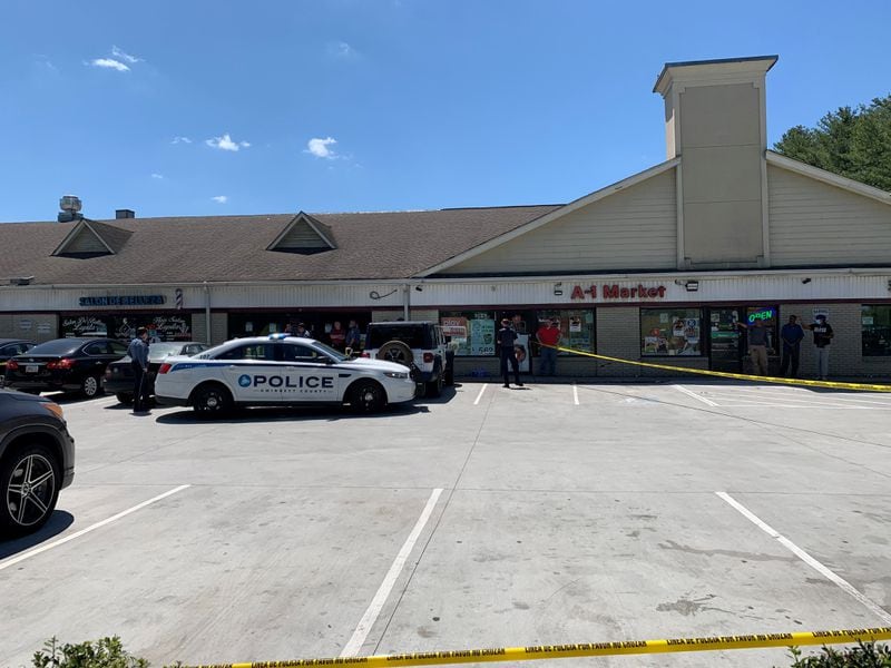 Police are still investigating the circumstances surrounding the deadly shooting outside the A-1 Market in Peachtree Corners.