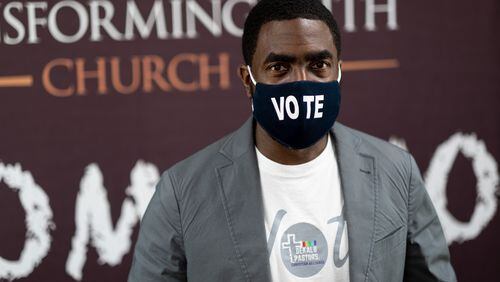 The Rev. Lee May, lead pastor at Transforming Faith Church, is encouraging congregants and others to vote. (Ben Gray for The Atlanta Journal-Constitution)