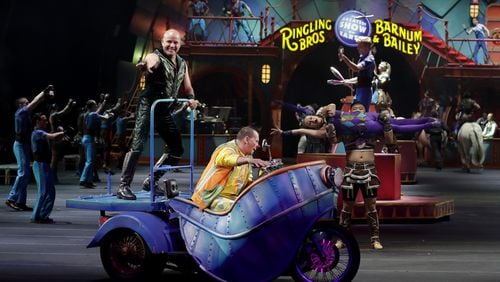 Ringling Bros. and Barnum & Bailey performers begin a show Saturday, Jan. 14, 2017, in Orlando, Fla. The Ringling Bros. and Barnum & Bailey Circus will end the "The Greatest Show on Earth" in May, following a 146-year run of performances. Kenneth Feld, the chairman and CEO of Feld Entertainment, which owns the circus, told The Associated Press, declining attendance combined with high operating costs are among the reasons for closing. (AP Photo/Chris O'Meara)