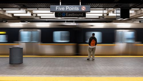 A lone passenger waits on an arriving train at MARTA’s Five Points station during rush hour Friday morning. MARTA rail ridership has dropped dramatically with the coronavirus pandemic. Ben@BenGray.com for the Atlanta Journal-Constitution