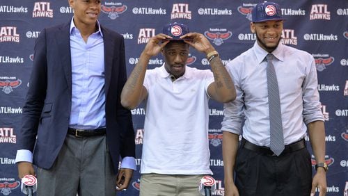 June 27, 2014 Atlanta: The Atlanta Hawks draft picks Walter Tavares, Lamar Patterson and Adreian Payne during a press conference Friday June 27, 2014 at Philips Arena. BRANT SANDERLIN /BSANDERLIN@AJC.COM .