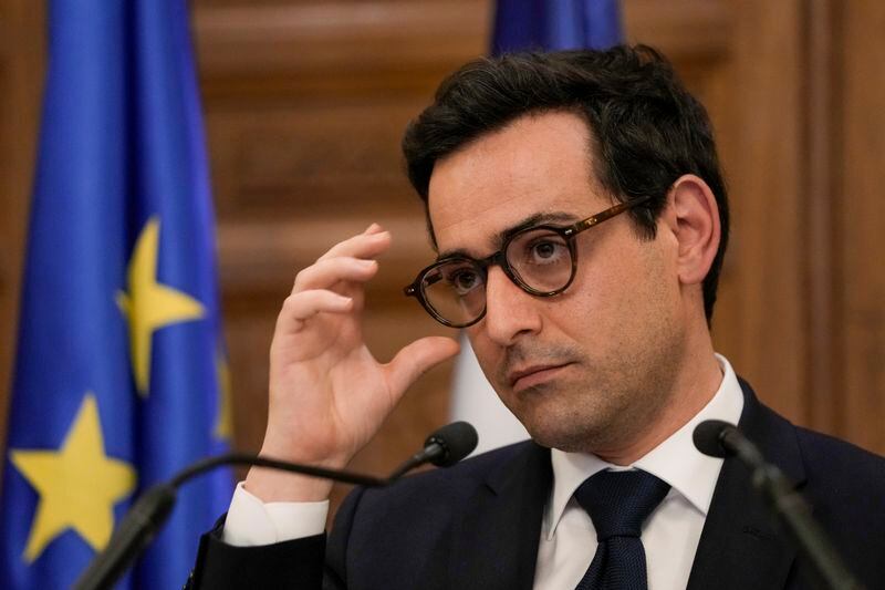 French Foreign Minister Stephane Sejourne adjusts his glasses as he listens to a question during a press conference at the Pine Palace, which is the residence of the French ambassador, in Beirut, Lebanon, Sunday, April 28, 2024. (AP Photo/Hassan Ammar)