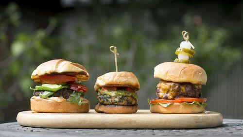 From left, Lamb Burger, Chicken Popeye Slider, and Great American Bacon and Beer Burger. (Kathleen Galligan/Detroit Free Press/TNS)