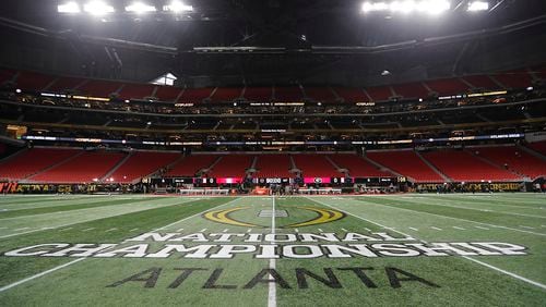 The championship logo is seen on the field at Mercedes-Benz Stadium before the NCAA college football playoff championship game between Georgia and Alabama, Monday, Jan. 8, 2018, in Atlanta. (AP Photo/David Goldman)