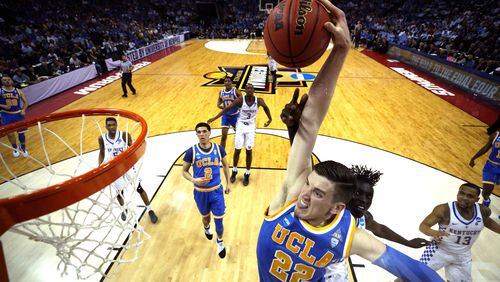 TJ Leaf of the UCLA Bruins goes up for a dunk against Wenyen Gabriel of the Kentucky Wildcats in the first half during the 2017 NCAA Men’s Basketball Tournament South Regional at FedExForum on March 24, 2017 in Memphis, Tennessee. (Photo by Andy Lyons/Getty Images)