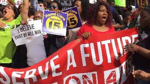 Hundreds participated in a “Fight for $15” protest in Atlanta demanding the minimum wage be raised. They are organizing a larger march planned for April 15. (HANDOUT)