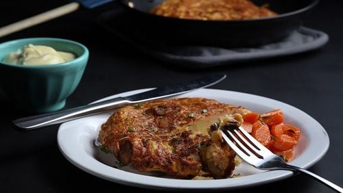 This chorizo and potato omelet is an ideal anchor for a Spanash tapas menu for eight. The herby garlic carrots in smoky sherry vinaigrette provide a tart counterpoint. (Abel Uribe/Chicago Tribune/TNS)