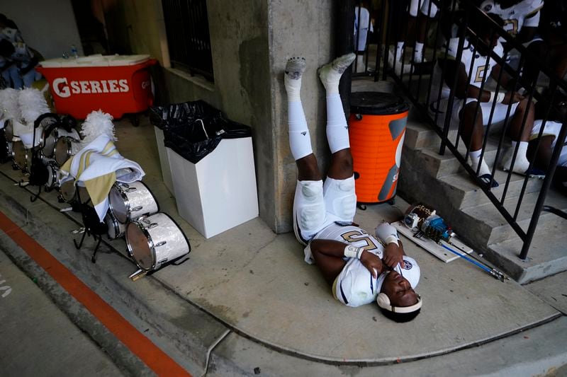 Georgia Tech defensive lineman Jared Ivey (15) waits out a lightning delay that halted play in the first half of an NCAA college football game against Clemson, Saturday, Sept. 18, 2021, in Clemson, S.C. (AP Photo/John Bazemore)
