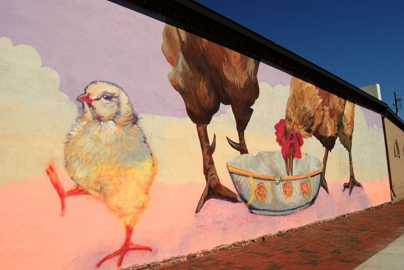 “Big Little Chickens” by Lindsey O’Shields plays on Marietta’s association with a certain large fowl. It’s at 17 Whitlock Ave. CONTRIBUTED: MARIETTA ARTS COUNCIL