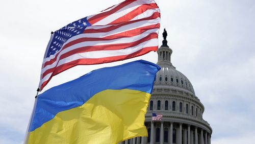 The American and Ukrainian flags wave in the wind outside of the Capitol on Tuesday, April 23, 2024, in Washington. The Senate is moving ahead with $95 billion in war aid to Ukraine, Israel and Taiwan. (AP Photo/Mariam Zuhaib)