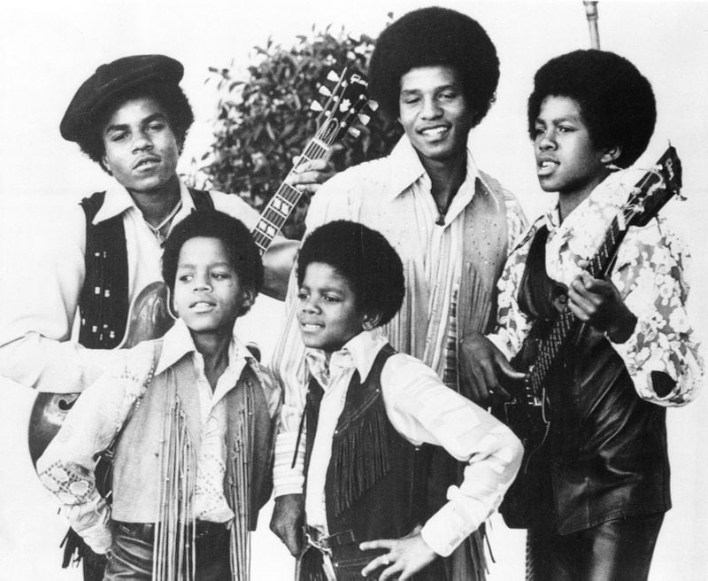 The Jackson 5, wearing their iconic Afros in an undated promotional image: in front, Marlon and Michael; in back: Tito, Jackie and Jermaine. "There is nothing wrong with wearing a natural, man. It is really cool," Tito Jackson said. "You always kept a pick in your back pocket or propped up in your hair somewhere.” (AP file)