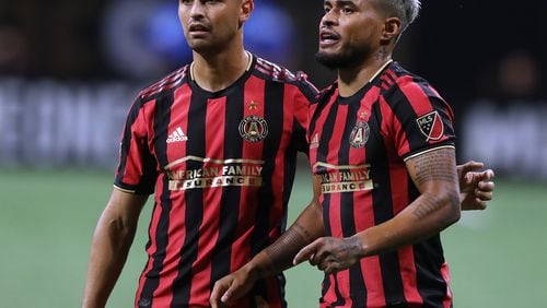 August 14, 2019 Atlanta: Atlanta United players Pity Martinez and Josef Martinez confer during the match against Club America in the Campeones Cup on Wednesday, August 14, 2019, in Atlanta.   Curtis Compton/ccompton@ajc.com