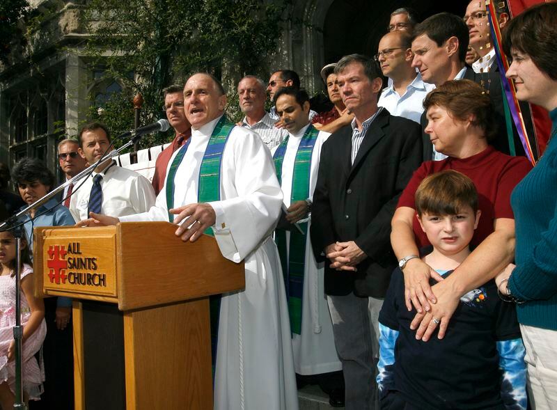 FILE - Rev. Edwin Bacon, of All Saints Episcopal Church, speaks out during a press conference in support of same sex marriages and in fighting Proposition 8, Sunday, Nov. 9, 2008, in Pasadena, Calif. When the United Methodist Church removed anti-LGBTQ language from its official rules in recent days, it marked the end of a half-century of debates over LGBTQ inclusion in mainline Protestant denominations. The moves sparked joy from progressive delegates, but the UMC faces many of the same challenges as Lutheran, Presbyterian and Episcopal denominations that took similar routes, from schisms to friction with international churches to the long-term aging and shrinking of their memberships. (AP Photo/Gus Ruelas, File)