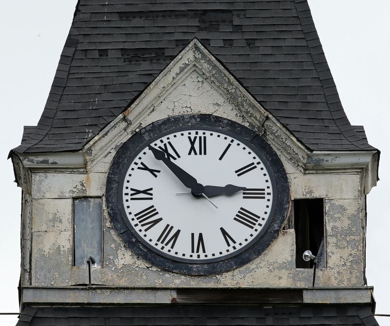 The clock tower on Morris Brown College’s Fountain Hall is stopped and the clock tower is falling apart. Noted scholar W.E.B. Du Bois maintained an office in Fountain Hall from 1897 until 1910 and wrote his book, “The Souls of Black Folk,” there. BEN GRAY / BGRAY@AJC.COM