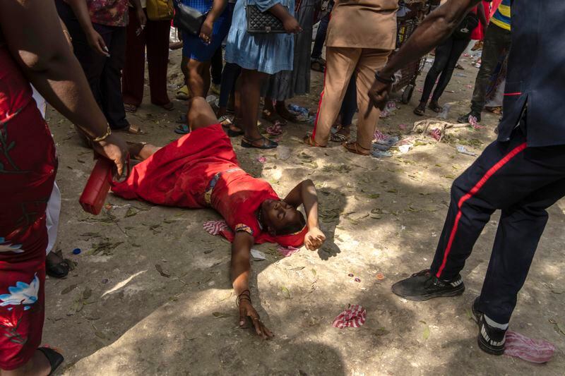 FILE - A Vodouist invokes a gede spirit, family of Iwa, during the Saint George celebration in Port-au-Prince, Haiti, April 24, 2024. Vodou has a single God known as “Bondye,” Creole for “Good God,” and more than 1,000 spirits known as the lwa — some that aren’t always benevolent.(AP Photo/Ramon Espinosa, File)