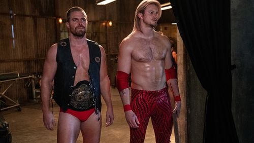 Stephen Amell and Alexander Ludwig plays brothers who run a local Georgia wrestling league in Starz's "Heels." STARZ