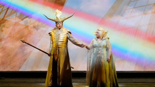 Wotan (Greer Grimsley) and Fricka (Elizabeth DeShong) prepare to take the rainbow bridge to Valhalla in The Atlanta Opera's landmark production of "Das Rheingold." (Photo by Ken Howard)