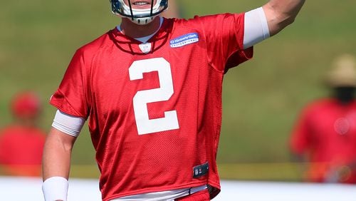 Falcons quarterback Matt Ryan calls a play on the first day of practice at training camp on Thursday, July 25, 2013, in Flowery Branch. CURTIS COMPTON / CCOMPTON@AJC.COM