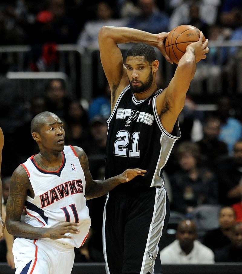  Tim Duncan, shown here in a 2011 game against the Hawks, sued his Atlanta investment advisor.