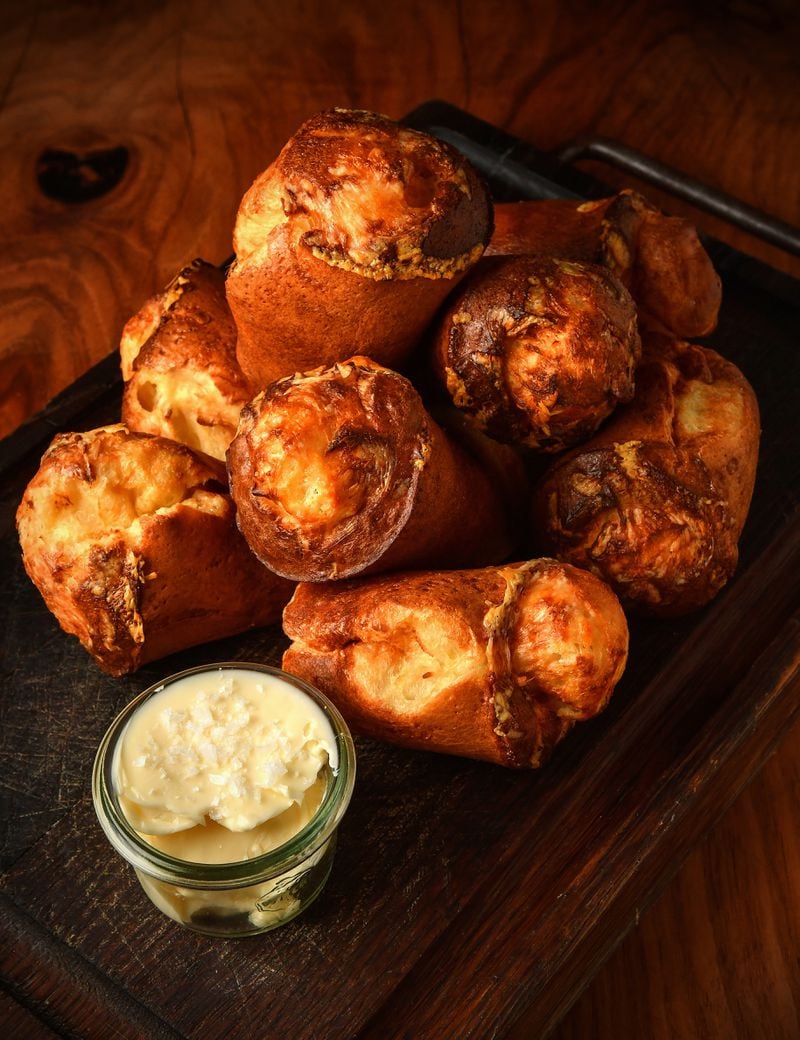 To make popovers such as these King + Duke White Cheddar Popovers, you'll want to use a popover pan. These pans are readily available and come in sizes that bake six or 12 popovers at a time. (Styling by Chrysta Poulos / Chris Hunt for the AJC)