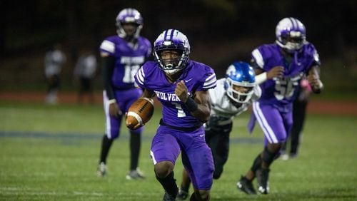 Miller Grove's Jayden Brown (1) runs the ball for a touchdown during a GHSA high school football game between Stephenson High School and Miller Grove High School at James R. Hallford Stadium in Clarkston, GA., on Friday, Oct. 8, 2021. (Photo/Jenn Finch)