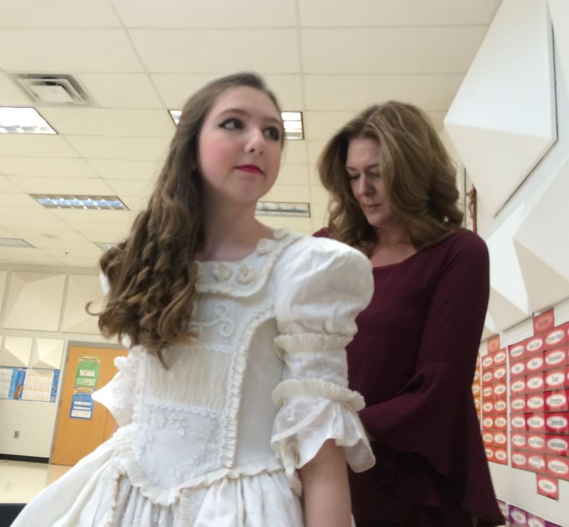 Jennifer Houlihan helps her daughter Claire getting ready for a dress rehearsal. Photo: Jennifer Brett