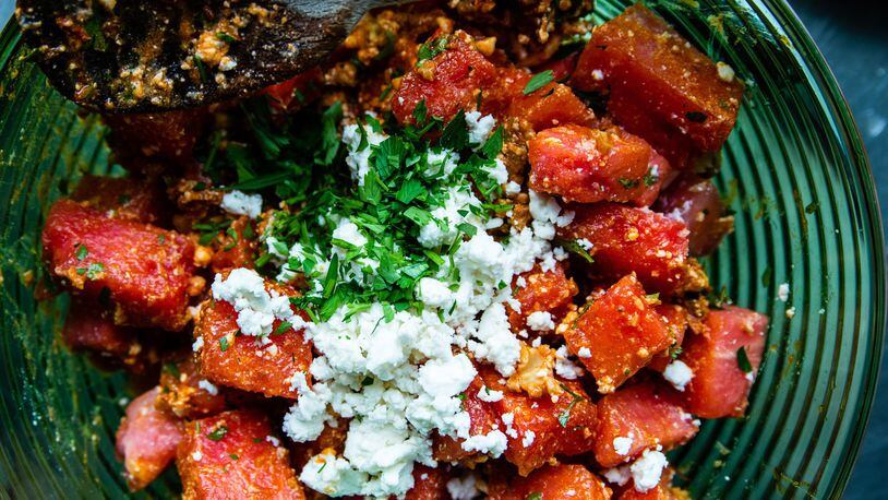 Sweet watermelon and salty feta have become a modern classic. Alon Shaya, the Israeli-born chef who lives in New Orleans, zips up the combination with a dressing made from spicy harissa. You may use store-bought harissa or make Shaya’s version. Recipes for the salad and the condiment are found in the chef’s new cookbook, “Shaya: An Odyssey of Food, My Journey Back to Israel” (Knopf, $35).