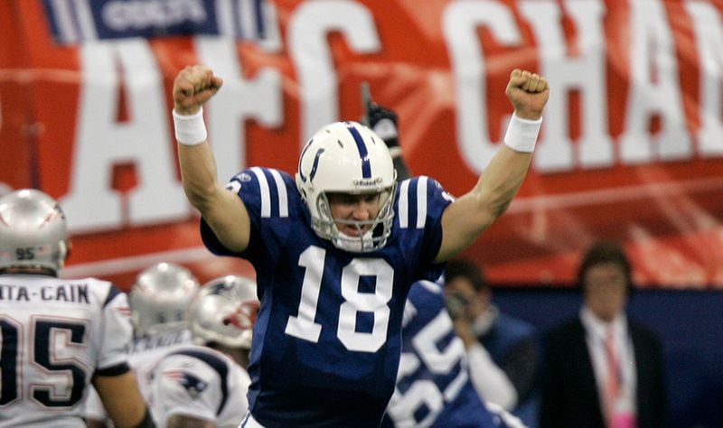 Indianapolis Colts quarterback Peyton Manning (18) celebrates running back Joseph Addai's three-yard touchdown run in the fourth quarter of the AFC Championship Game against the New England Patriots, Jan. 21, 2007, in Indianapolis. (Amy Sancetta/AP)