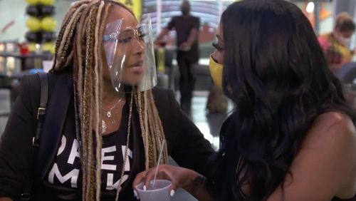 Cynthia Bailey and Kenya Mooer in the season 13 premiere of ‘The Real Housewives of Atlanta.’ Credit: Bravo