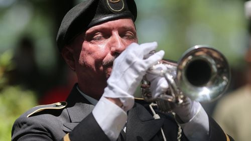 Rafael Picklesimer plays taps to close a Roswell Remembers Memorial Day celebration in this 2016 file photo.