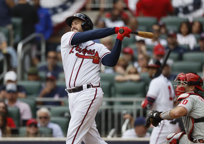Atlanta Braves' Travis d'Arnaud strikes out to end the third inning of game one of the baseball playoff series between the Braves and the Phillies at Truist Park in Atlanta on Tuesday, October 11, 2022. (Jason Getz / Jason.Getz@ajc.com)