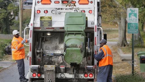 Condo owners will pay $120 a year for bulk trash pickup and other services under a garbage fee plan passed Monday by the Atlanta City Council.. Bob Andres bandres@ajc.com