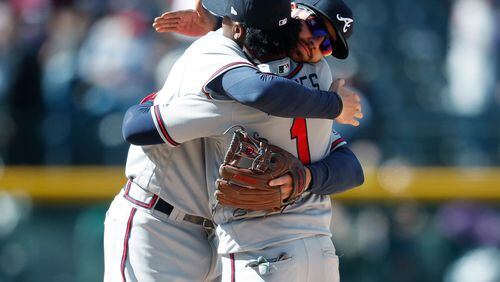Dansby and Ozzie hug it out.