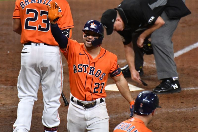 Houston Astros second baseman Jose Altuve celebrates his solo home run during the seventh inning against the Atlanta Braves in game 2 of the World Series at Minute Maid Park, Wednesday October 27, 2021, in Houston, Tx. Hyosub Shin / Hyosub.Shin@ajc.com