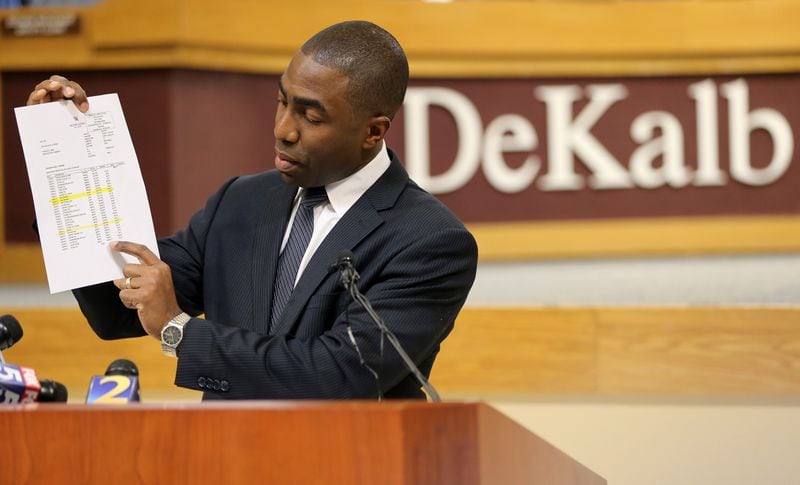 At a press conference hours after his special investigators released their stinging final report, interim DeKalb County CEO Lee May raised questions about its contents, pointing to his Hawaii hotel bill. BEN GRAY/ BGRAY@AJC.COM