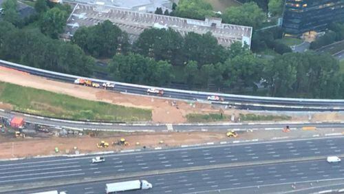 I-285/westbound traffic in Dunwoody re-opened after a slow, half-hour traffic pace to guide vehicles to the new ramp to GA-400/northbound on July 2nd, 2021. Credit: Doug Turnbull, WSB Skycopter.