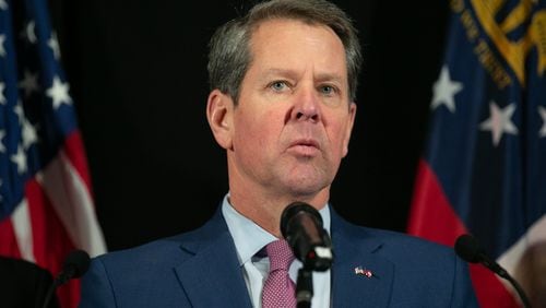 Gov. Brian Kemp, shown before a high school tour on Thursday, Feb. 13, 2020, wants to know why Georgia Military College officials think they don’t have enough for raises for workers. REBECCA WRIGHT / FOR THE AJC
