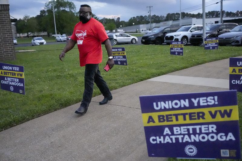 Volkswagen automobile plant employee Alvin Brookfield arrives for a watch party to see the results of their union election Friday, April 19, 2024, in Chattanooga, Tenn. Workers finished voting Friday night on whether to join the United Auto Workers union. (AP Photo/George Walker IV)