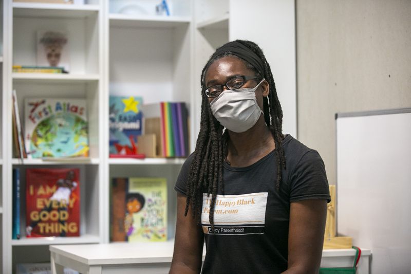 Makeisha Robey, founder of The Happy Black Parent, poses for a photo in her space in the Nia Building at Pittsburgh Yards, a professional and maker space in southwest Atlanta on Tuesday, September 7, 2021. (Rebecca Wright for the Atlanta Journal-Constitution)