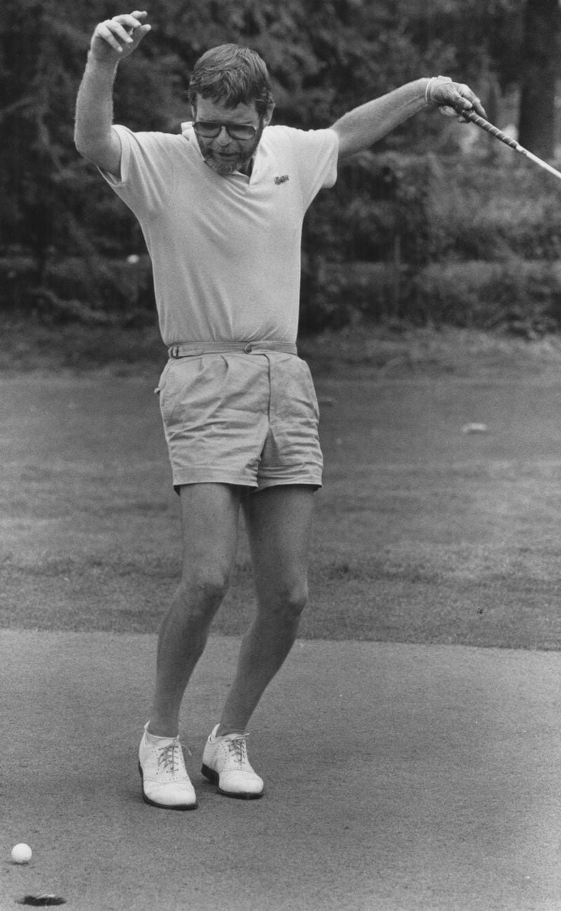 An undated photo of Lewis Grizzard enjoying a friendly little game of golf at the Ansley Golf Club in Atlanta. (Nick Arroyo/AJC staff)