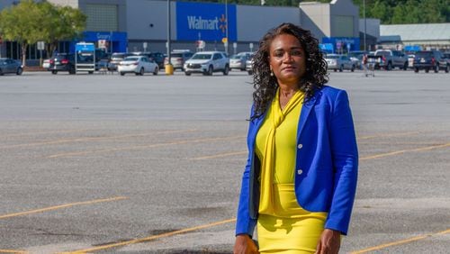 State Rep. Donna McLeod, D-Lawrenceville, stands near the Walmart on Collins Hill Road in Lawrenceville, where a license plate-reading camera has been installed. STEVE SCHAEFER FOR THE ATLANTA JOURNAL-CONSTITUTION
