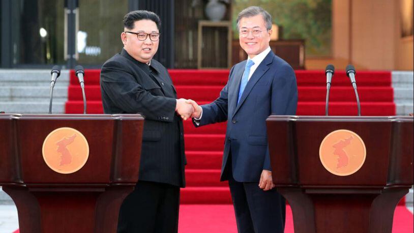 South Korean President Moon Jae-in, right, said President Donald Trump deserves a Nobel Peace Prize for his efforts in ending the stalemate with North Korea and its leader, KIm Jong Un, left.