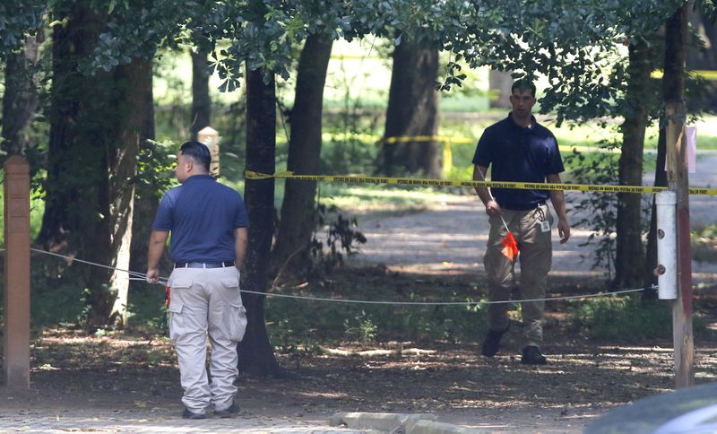 Authorities said parkgoers discovered the woman's body about 6:30 a.m. 