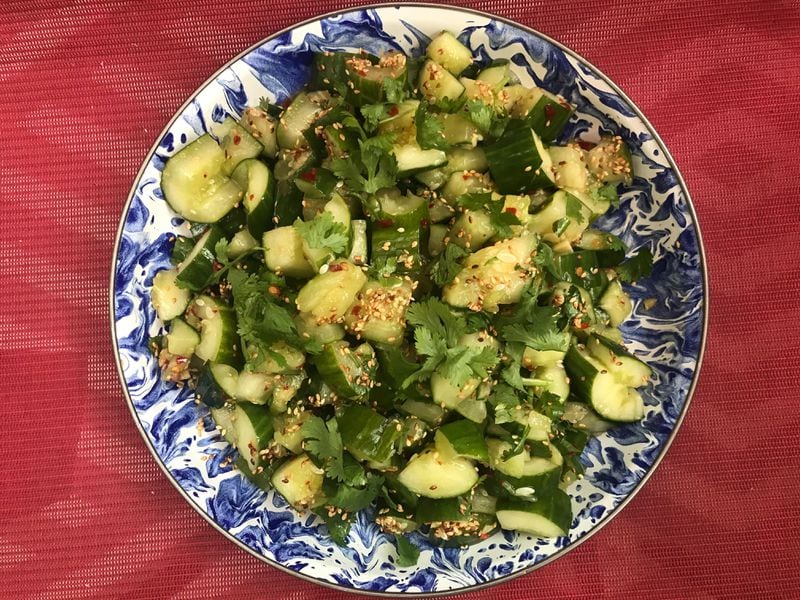 Eating this salad is almost as satisfying as smashing the cucumbers for it. LIGAYA FIGUERAS / LIGAYA.FIGUERAS@AJC.COM