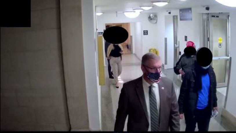 The House committee investigating the Jan. 6 attack on the U.S. Capitol on Wednesday released photos from a Capitol complex tour led by Rep. Barry Loudermilk the day before the attack.