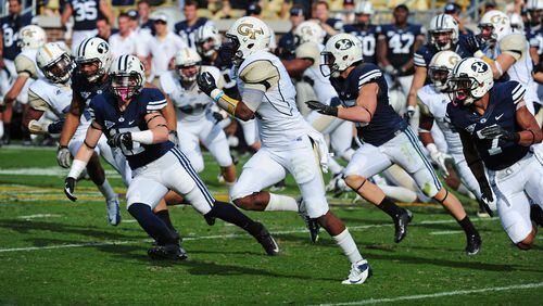 Georgia Tech return specialist Jamal Golden in one of his best moments - returning a kickoff for a touchdown against BYU in 2012, ending a 177-game streak without a kick return for a score. (Photo by Scott Cunningham/Getty Images)
