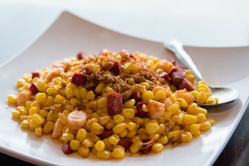 The stir-fried Cajun corn at Kajun Crab can remind you of a French dish or a Vietnamese one. CONTRIBUTED BY HENRI HOLLIS